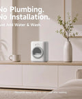 Slim Portable Mini Washer That Crushes Small Loads Without The Hassle A Real Game Changer For Dorm Life And Weekend Trips With Snappy USB C Charge on a wooden table.