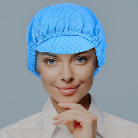 Five Piece Anti Static Work Caps Blue Bouffant Hair Nets Lightweight Mesh Headcaps on a woman smiling, breathable for cleanrooms.