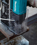 Side view of Makita HB350 1-3/8 in magnetic drill with teal body and clear safety guard.