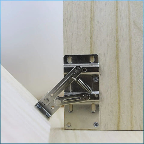 Heavy Duty Steel Tip Out Tray Hinges For 45 Degree Cabinet Drawer Pullouts Featuring Rock Solid Scissor Hardware With Brushed Nickel Finish on a wooden surface.