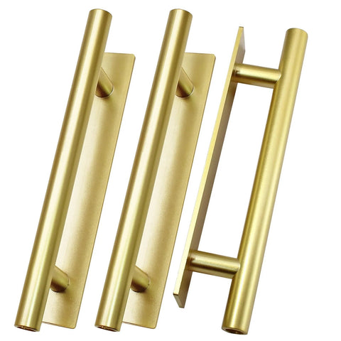 Gold finish ABS plastic handles for cabinets and drawers, shown close-up. 10 Pack Self Adhering Push Pull Handles ABS Plastic For Wardrobe Cabinets.