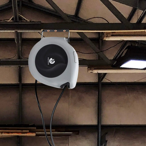 Retractable Air Hose Reel With Three Eighths Inch By 50 Ft Hybrid Polymer Hose Auto Rewind Enclosed Shop Ready Mount Heavy Duty 180 Degree Swivel 300 PSI Pro Grade Commercial Quality Polypropylene Gray installed on ceiling.