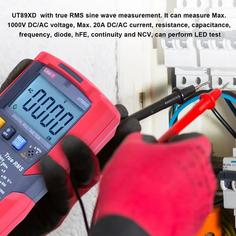 Pro Grade Digital Multimeter With TRMS 6000 Counts Reads 1000V AC DC, 20A Current in use with electrical panel, gloved hand visible