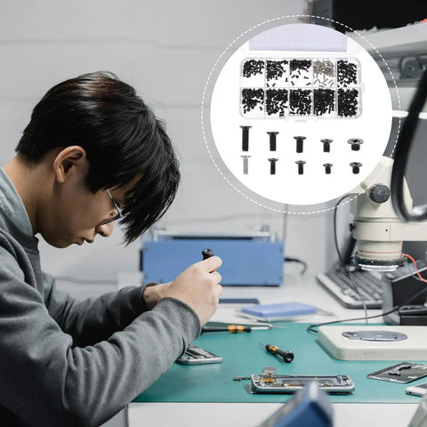 Technician using 500 Piece Laptop Screw Kit with Flat Head Self Tapping Screws for laptop motherboard and graphics card repair.