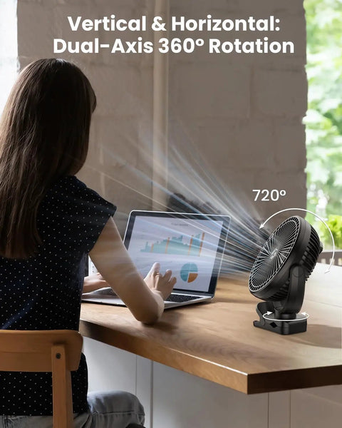 Clip On Fan For Golf Cart With 150 Hours Battery Life on desk near person working on laptop