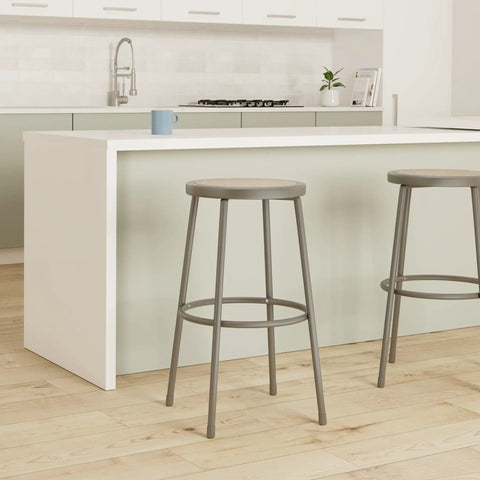 Modern kitchen with heavy duty industrial metal shop stool backless with built in foot ring, 30 inch seat height, gray base.