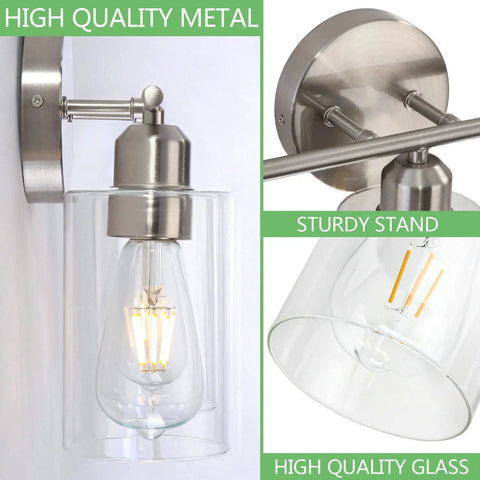 Close-up of Three Light Bathroom Vanity Light In Brushed Nickel Finish With Clear Glass Shades, wall mounted modern style.