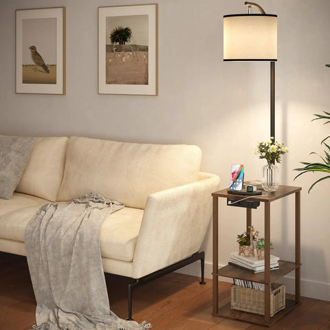 Floor Lamp With Table And USB Charging Station End Table With Shelves Linen Lampshade in living room next to beige sofa