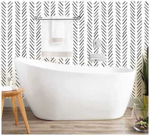 Bathroom with Boho Peel And Stick Chevron Wallpaper Self Adhesive Mural In Black And White Stripes 17.7In By 32.8Ft behind a bathtub