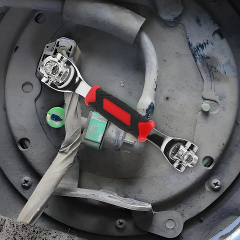 Universal Socket Wrench 48 In 1 With Rotating Head Multi Bit Fastener Tool Heavy Duty set on machinery background for repairs.