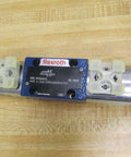 4WE 6 D62/OFEG24N9K4/ZV Directional Solenoid Spool Valve R901068630, top view, showing connectors and housing, used for industrial machines.