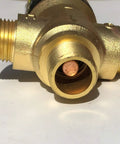 Close-up of thermostatic mixing valve with one half NPT male connections water temperature controller valve solid brass body.