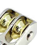 Close-up of Four Pack 1.42 Inch Double Pulley Block Set stainless steel and zinc alloy for lifting heavy duty rope and cable
