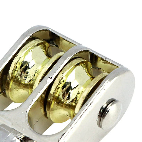 Close-up of Four Pack 1.42 Inch Double Pulley Block Set stainless steel and zinc alloy for lifting heavy duty rope and cable
