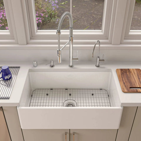 Protective Sink Grid For GR533 And AB532 AB533 Stainless Steel in kitchen sink with faucet and cutting board, 304 grade.