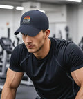 Man wearing Navy Mens Breathable Summer Cap With Top Vent Holes, Adjustable Strap, Lightweight And Sweat Wicking Hat in gym
