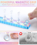 Hand placing magnet on Heart Shaped Magnetic Nail Stand Set For Press Ons, Acrylic Nail Holders For Nail Art Display.