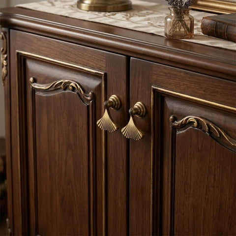 Gold Cabinet Knobs 4 Pack Fan Shaped Drawer Handles Made From Solid Zinc Alloy for Dresser shown on wooden cabinet