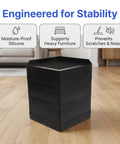 2 Pack Silicone Furniture Pads For Table And Chair Legs Square 3.35 Inch Nonslip Noise Reducing Foot Pads in a living room