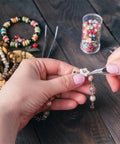Jump Ring Jewelry Making Kit With 1200 Silver And Gold Rings Pliers Tweezers Opener And Brass Ring Tools For Necklace Repairs And DIY Jewelry Projects in use