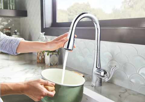 Arbor Chrome One-Handle Kitchen Faucet With Pull Down Sprayer Featuring Power Boost And Reflex For Faster Clean And Fill in use