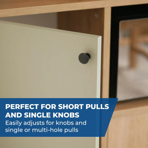 Close-up of a cabinet door with a single black knob pull, demonstrating its compatibility with various knob and pull designs.