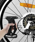 Person using High Precision Aluminum Bicycle Spoke Tension Meter Tool For MTB And Road Bikes on rear wheel spokes