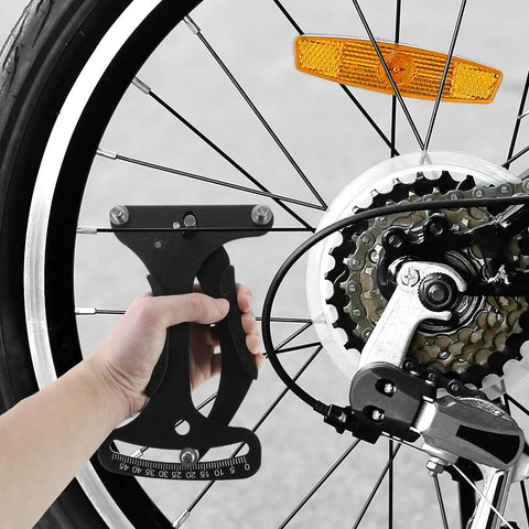 Person using High Precision Aluminum Bicycle Spoke Tension Meter Tool For MTB And Road Bikes on rear wheel spokes