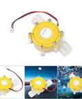 Compact Hydro Turbine System With F50 Regulated DC Micro Generator for tiny water flow power, shown in yellow plastic casing.