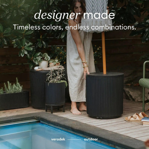Durable Outdoor Umbrella Side Table With Umbrella Hole For Patio Or Porch beside pool with plants, plastic stone composite