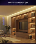 Room with illuminated shelves using Dope Lightstrip Starter Kit With A 6Ft LED Strip, Base Plug, And Hue Hub For PC Sync.