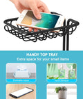 Hand placing smartphone on Free Standing Toilet Paper Holder With Shelf In Black Finish Floral Pattern Holds Three Jumbo Mega Rolls On Storage Arm And One On The Dispenser No Brainer Easy To Assemble RV Bathroom Organizer.
