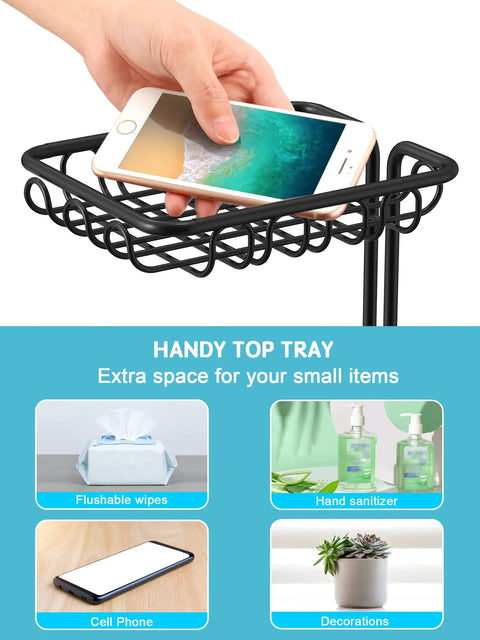 Hand placing smartphone on Free Standing Toilet Paper Holder With Shelf In Black Finish Floral Pattern Holds Three Jumbo Mega Rolls On Storage Arm And One On The Dispenser No Brainer Easy To Assemble RV Bathroom Organizer.