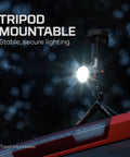 Beast Handheld Spotlight With 0.75 Mile Reach 780 Lumens And 362500 Cd Rugged Waterproof LED Flashlight mounted on tripod