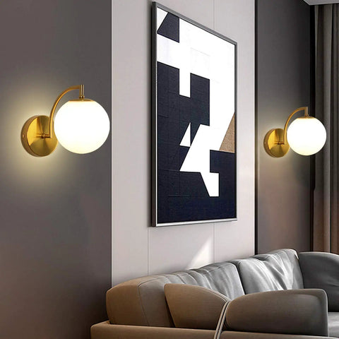 Mid Century Gold Wall Sconce Set Of Two with milky globe shade in living room, brass finish, modern style dope lighting