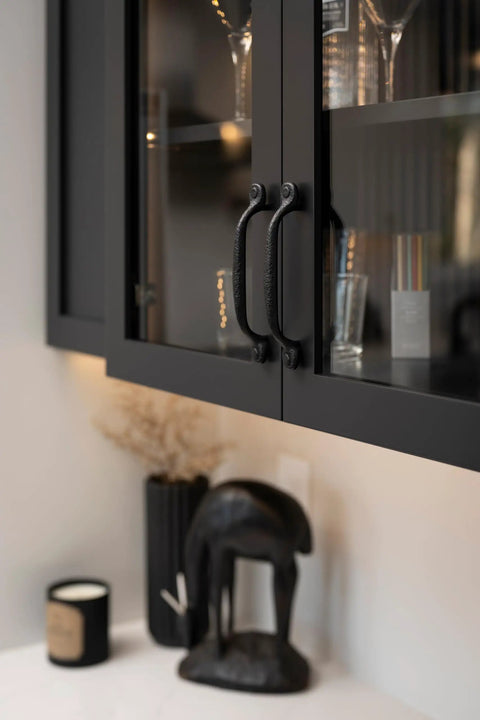 Solid Core Kitchen Cabinet Pulls Pack Of 10 In Black Iron For Doors And Dresser Drawers Luxury Hardware With Three Quarters Of An Inch Hole Center Heavy Duty Black Rustic Style From Refined Rustic Collection displayed on cabinet doors.