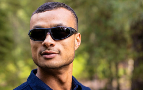 Man wearing Romer 3 Sunglasses With Changeable Lenses ANSI Z87 Ballistic Rated Eye Protection For Shootin Fishin Bikin And Extreme Sports.