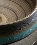 Bathroom Vessel Sink Vintage Hand Engraving Skirted Vessel, Ceramic Round Sink, detailed view of artistic swirl design.
