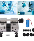 Heavy Duty Dual Cylinder Oil Free Vacuum Pump With Slick 110V Copper Motor 1440RPM, laboratory setup with compression equipment.