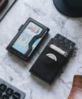 Slim Minimalist RFID Blocking Wallet With ID Window And Pop Up Card Holder, Everyday Carry Essentials, shown open on marble surface