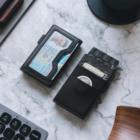 Slim Minimalist RFID Blocking Wallet With ID Window And Pop Up Card Holder, Everyday Carry Essentials, shown open on marble surface