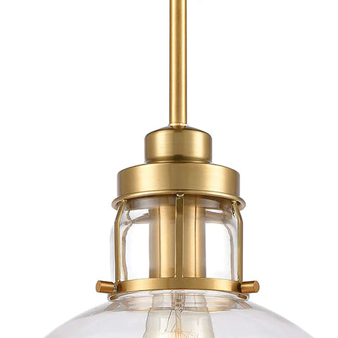 Close-up of Manhattan Boutique Mini Pendant Light In Brushed Brass Finish With Clear Glass Sleek Modern Look Durable Steel Construction