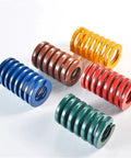 Bad Boy 10 Piece Pack Of Tough As Nails Steel Compression Springs Built For Industrial Die Mold Tooling And Heavy Machinery Applications Measuring One Hundred Mm in various colors.