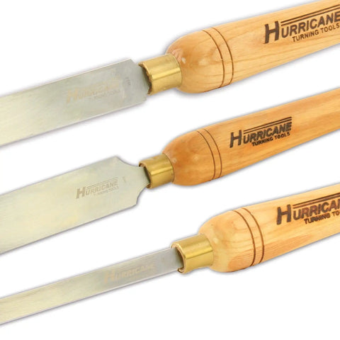 No Frills Skew Chisel Set For Woodturning Projects Built Tough With High Speed Steel Cutting Edges and Grippy Beech Handles visible.
