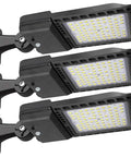 Three Crazy Bright 300W LED Parking Lot Lights With Adjustable Arm Mount 39000 Lumens 5000K Shoebox Style IP65 Waterproof