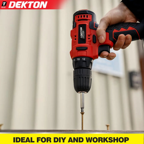Red and black Dekton power drill driving a screw into wood, suitable for DIY and workshop projects.
