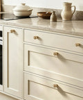 Premium Zinc Alloy Cabinet Knobs And Drawer Pulls One Inch Round Ball Champagne Bronze Finish on kitchen cabinet drawers.