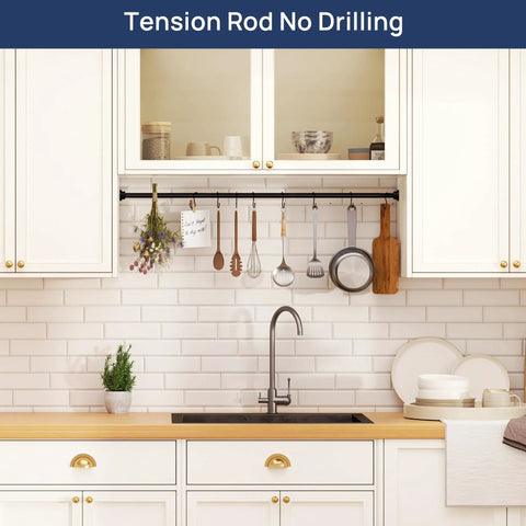 Tension rod holding utensils above kitchen sink, showcasing 2 pack adjustable spring tension curtain rods 32 to 66 inches stainless steel matte black no drilling easy install for window bathroom closet room divider 7 eighth inch diameter.