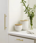 Kitchen setting featuring 7 Inch Center To Center Golden Champagne Cabinet Pulls Set Of 10, Nine And Three Eighths Inch Overall Length