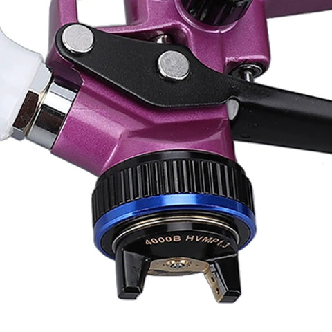 Close-up of Pro Grade Hvlp Spray Gun With 600 Ml Gravity Feed Cup showing stainless steel nozzle and copper aircap.